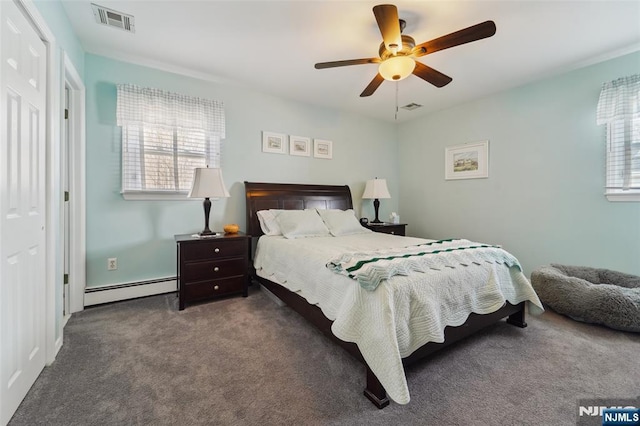 bedroom featuring carpet, a baseboard radiator, visible vents, and a ceiling fan