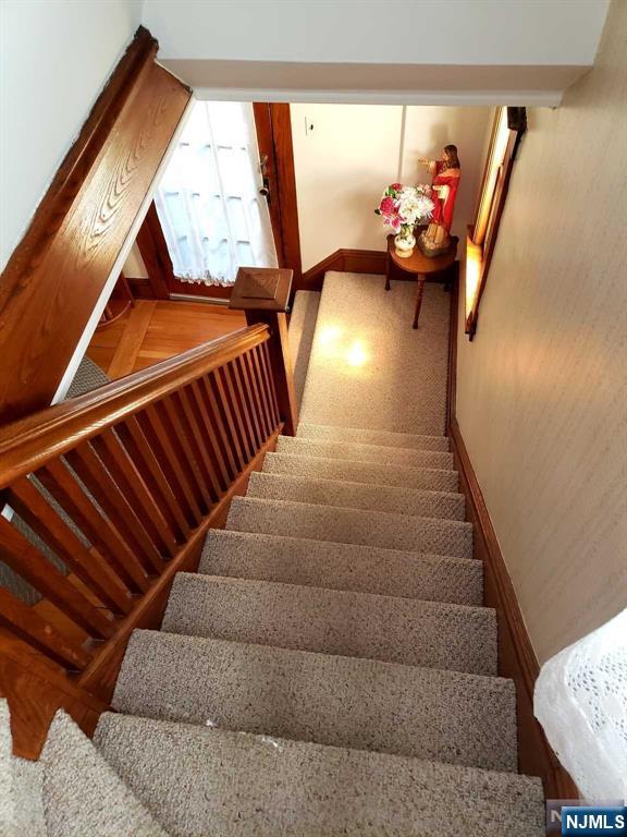 staircase with baseboards