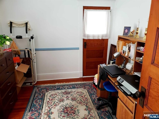 office area with dark wood-type flooring