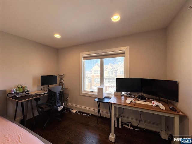 office featuring baseboards, wood finished floors, and recessed lighting