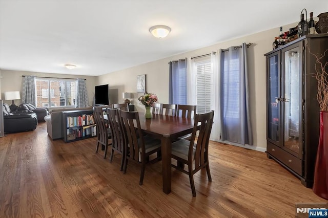 dining area featuring wood finished floors