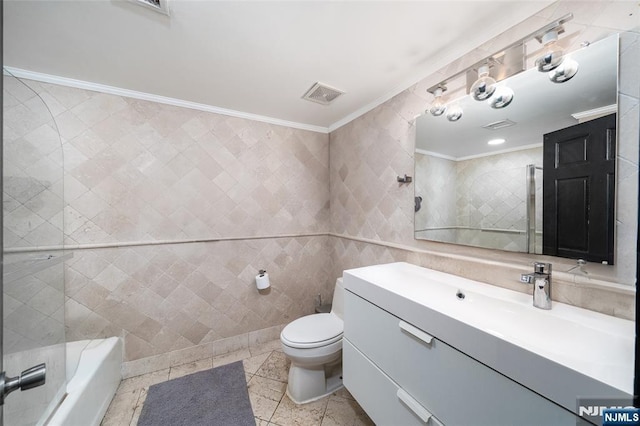 full bath with toilet, tile walls, vanity, visible vents, and crown molding