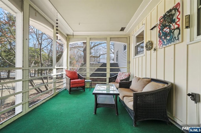 sunroom featuring visible vents