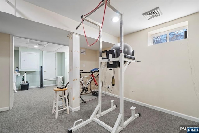 workout room with visible vents and baseboards