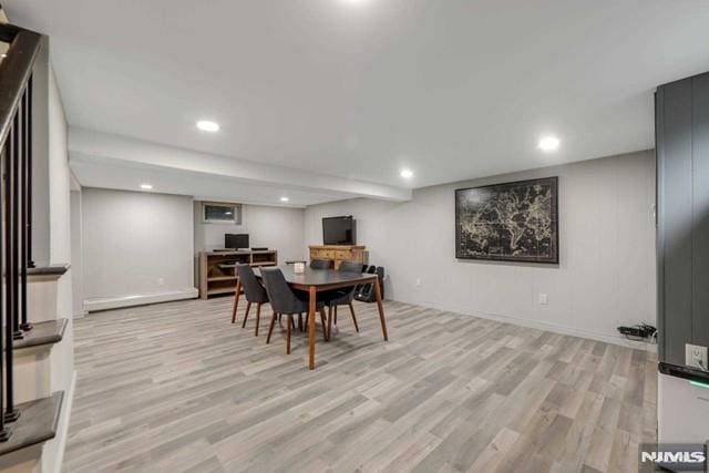 dining room with recessed lighting and light wood-type flooring