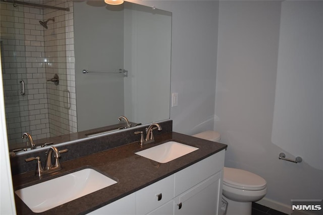 198 Wallace St, Orange, NJ 07050 - full bathroom with a shower stall, toilet, and a sink
