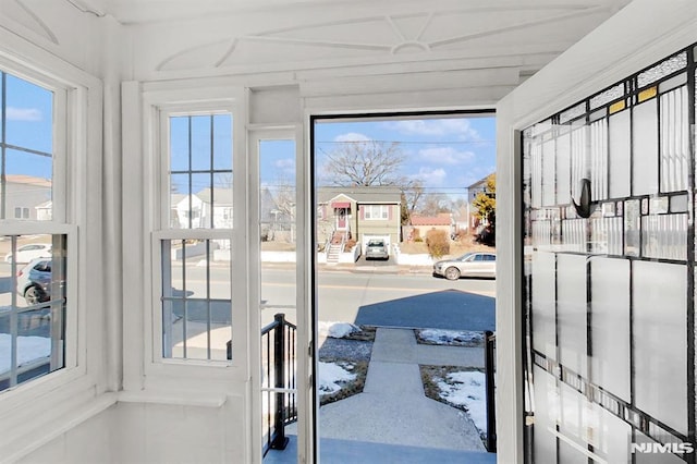 doorway to outside with a healthy amount of sunlight