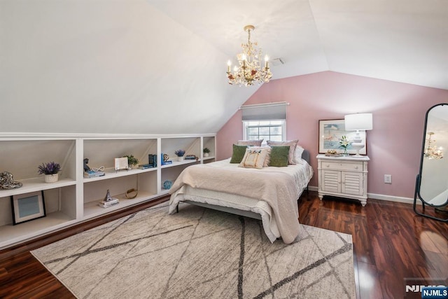 bedroom with baseboards, lofted ceiling, an inviting chandelier, and wood finished floors