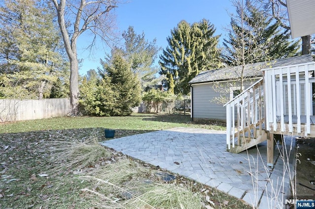 view of yard with a patio area and a fenced backyard