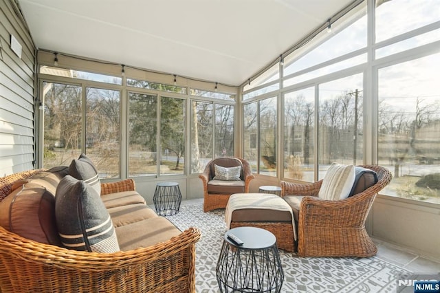 sunroom / solarium with lofted ceiling