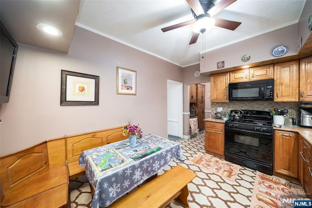 kitchen featuring backsplash, ceiling fan, light countertops, ornamental molding, and black appliances