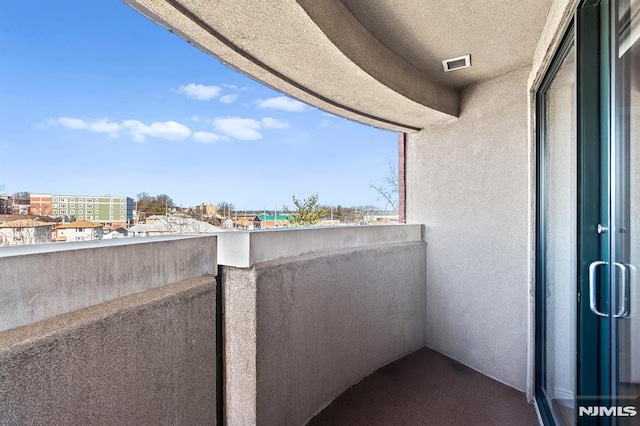 balcony featuring visible vents