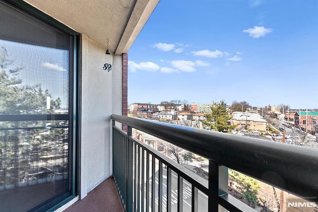 balcony featuring a view of city