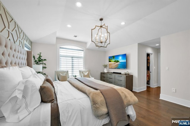 bedroom featuring a notable chandelier, baseboards, dark wood-type flooring, and recessed lighting