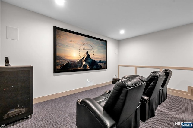 carpeted home theater room featuring recessed lighting and baseboards