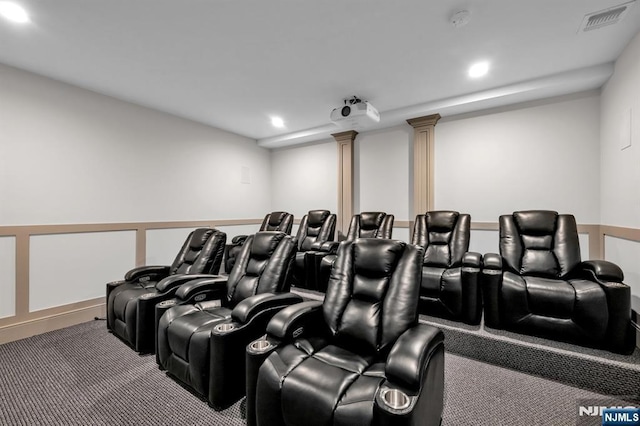 home theater with decorative columns, visible vents, a wainscoted wall, carpet flooring, and recessed lighting