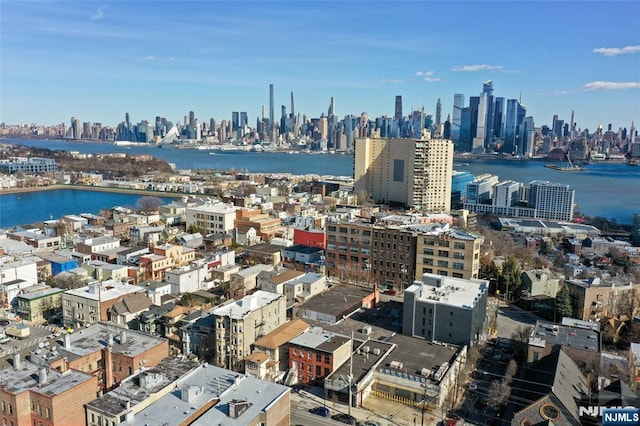 property's view of city featuring a water view