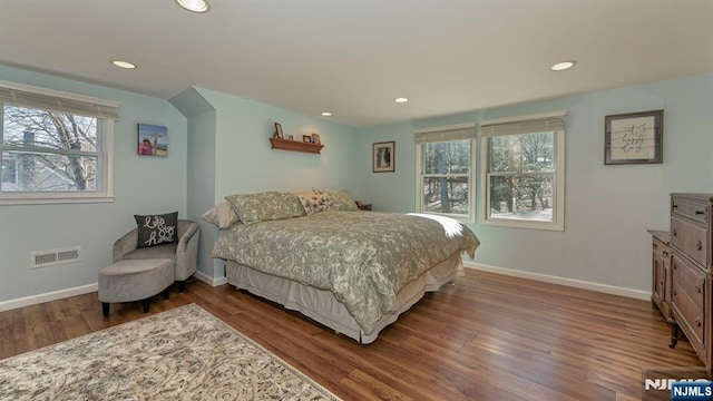 bedroom with visible vents, recessed lighting, baseboards, and dark wood-style flooring