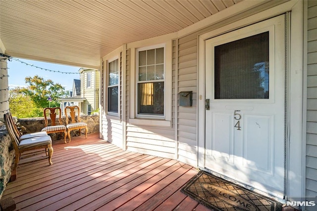 wooden deck with covered porch