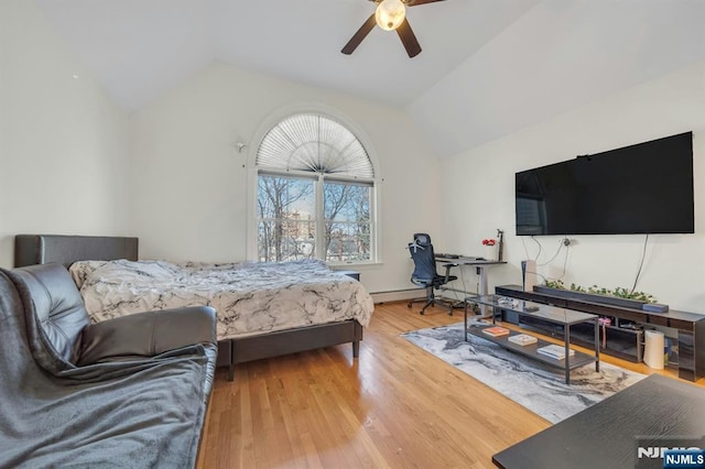 bedroom featuring lofted ceiling, ceiling fan, and wood finished floors