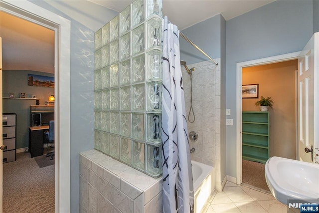 full bath with shower / tub combo and tile patterned flooring