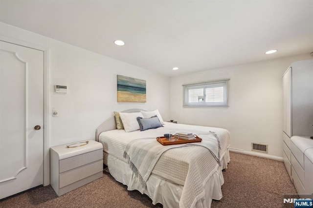 bedroom featuring carpet floors, recessed lighting, visible vents, and baseboards