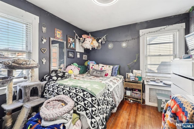 bedroom featuring hardwood / wood-style flooring