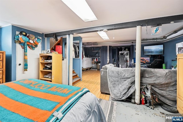 bedroom with wood finished floors