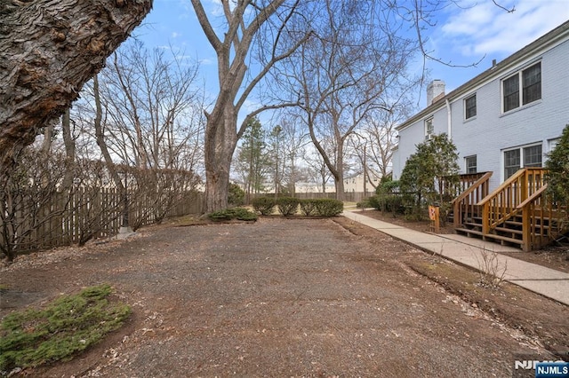 view of yard featuring fence