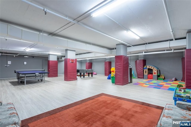 rec room with wood finished floors
