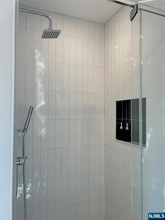 room details featuring a stall shower