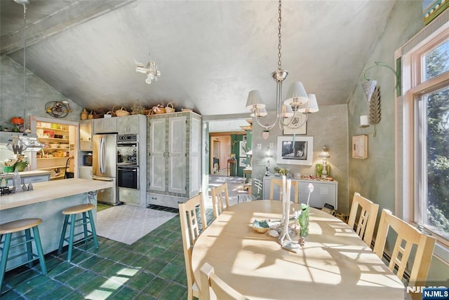 dining area featuring lofted ceiling with beams, tile patterned floors, and a notable chandelier