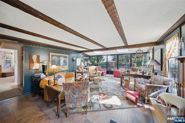 living room with beam ceiling