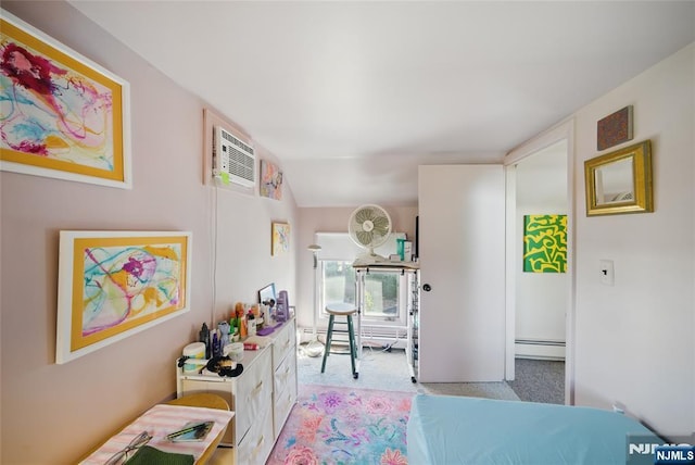 bedroom with a baseboard heating unit, lofted ceiling, light carpet, and a wall unit AC