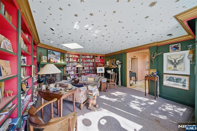 carpeted office with ornamental molding, wall of books, and a skylight