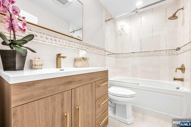 bathroom featuring  shower combination, visible vents, vanity, and toilet