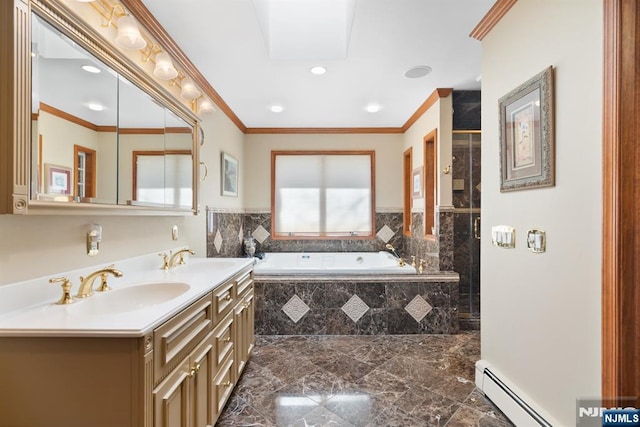 full bathroom featuring a garden tub, ornamental molding, baseboard heating, and a sink