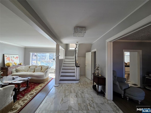 living room featuring stairway, marble finish floor, and crown molding