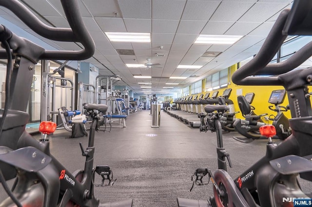 gym featuring a drop ceiling