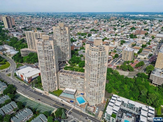 birds eye view of property featuring a view of city