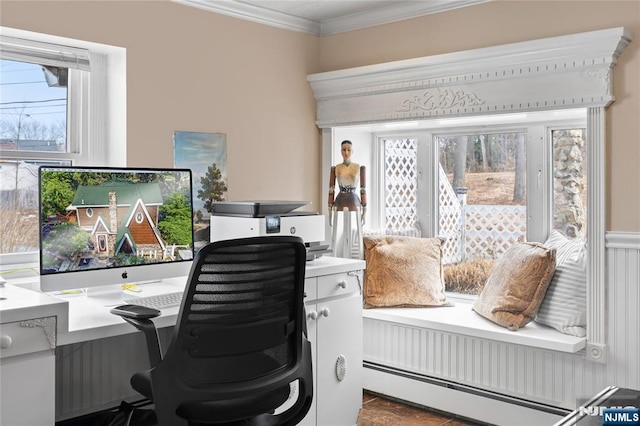 home office featuring a baseboard heating unit and crown molding