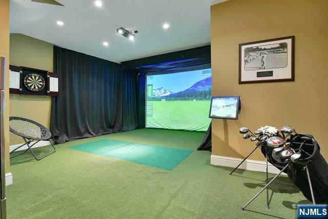 playroom featuring golf simulator, carpet floors, recessed lighting, vaulted ceiling, and baseboards