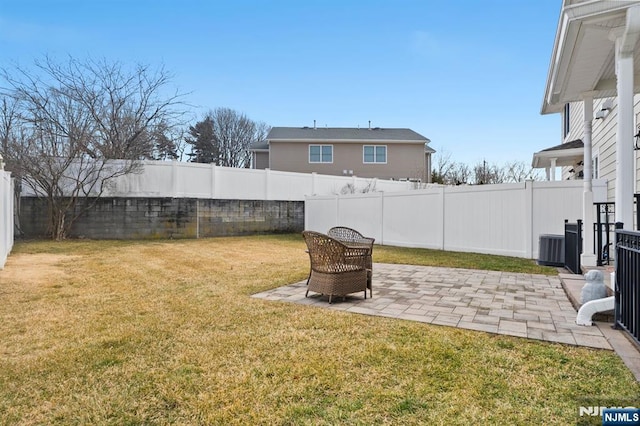 view of yard with a fenced backyard and a patio