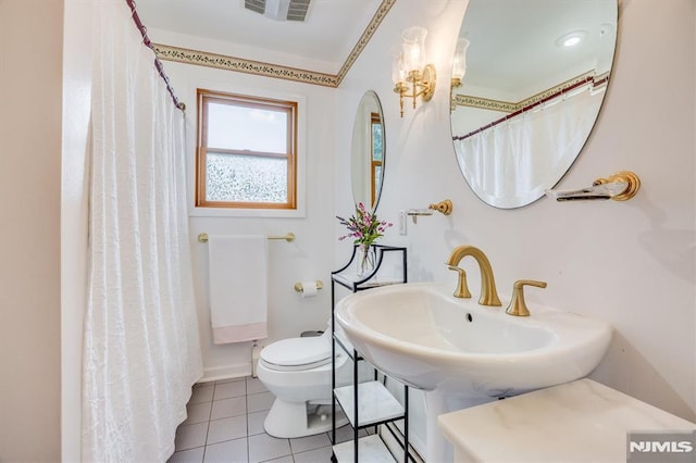 full bathroom with visible vents, curtained shower, tile patterned flooring, and toilet