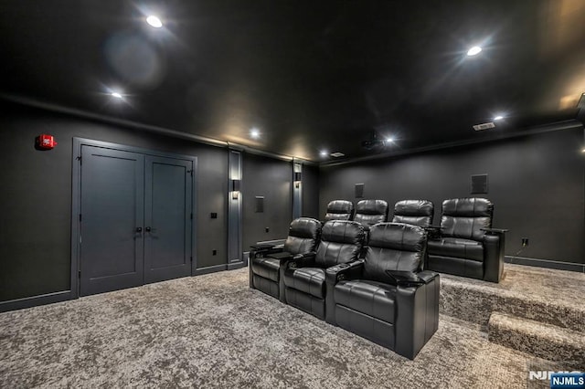 cinema room featuring recessed lighting, carpet flooring, visible vents, and baseboards