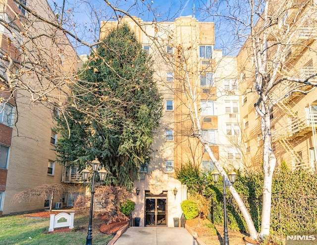 view of building exterior featuring central AC