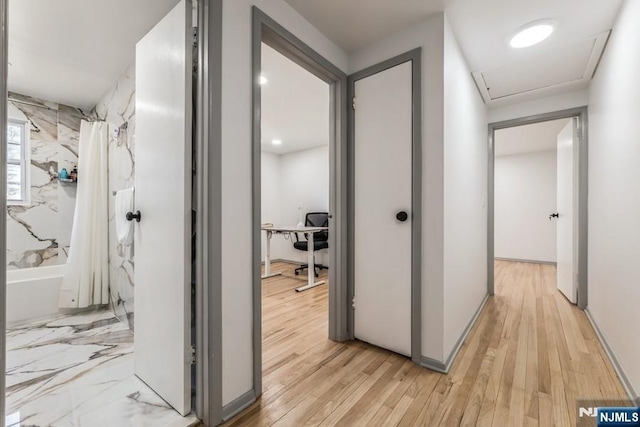 hall featuring light wood finished floors