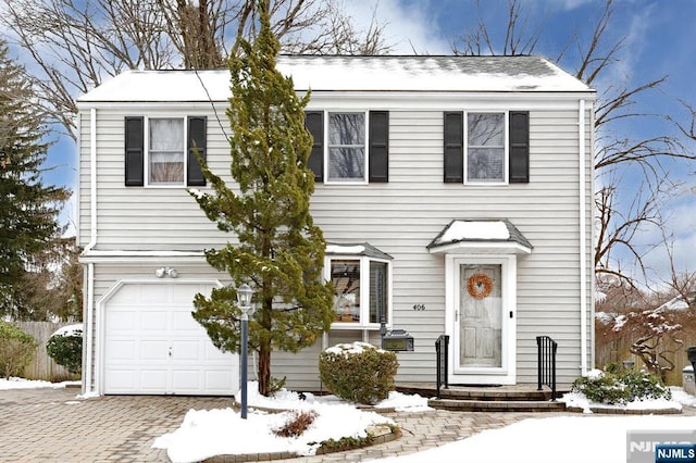 view of front facade with an attached garage