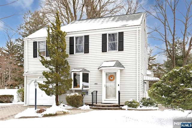 view of front of home featuring a garage