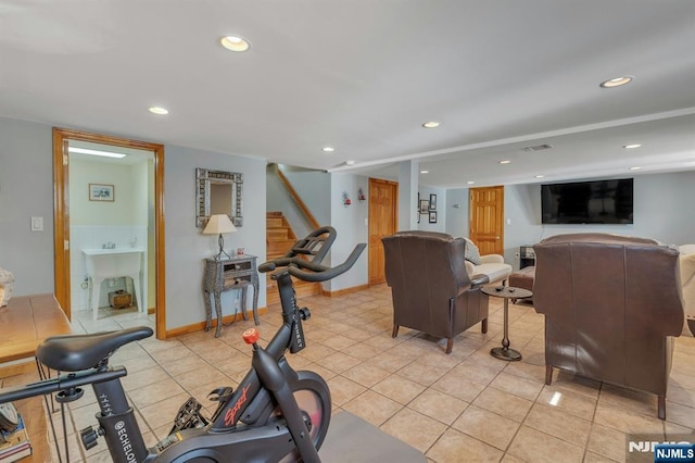 exercise room with visible vents, light tile patterned flooring, recessed lighting, and baseboards